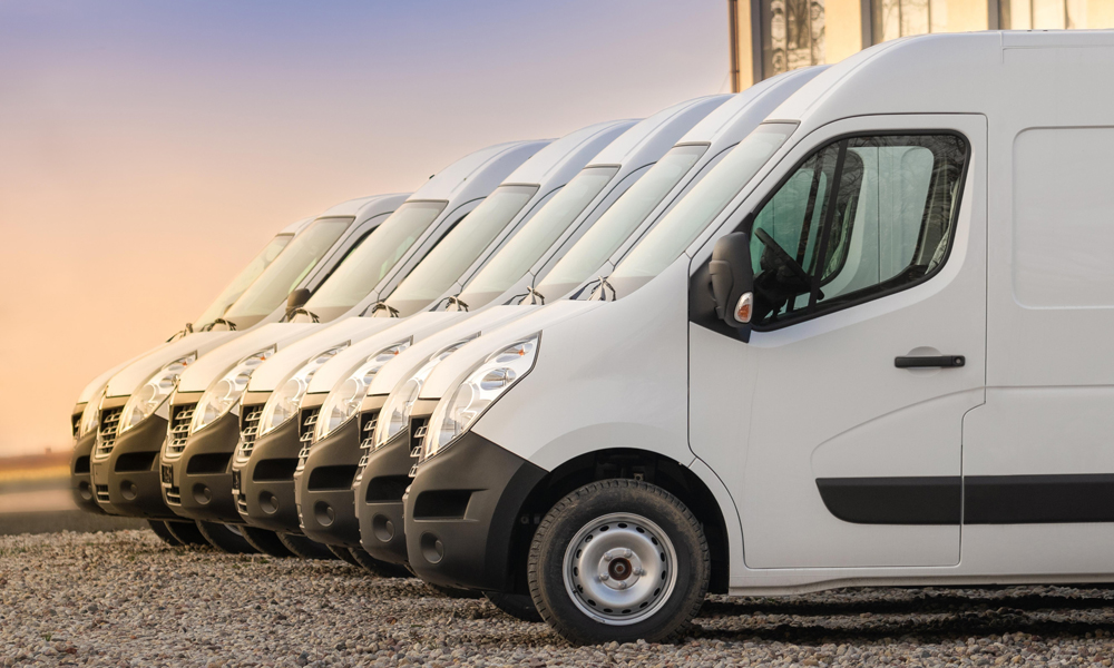 Several utility vans lined up Several utility vans lined up