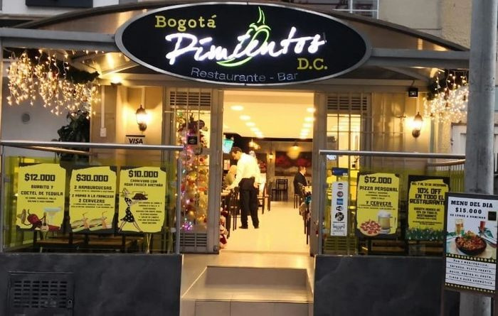 Happy chef in kitchen