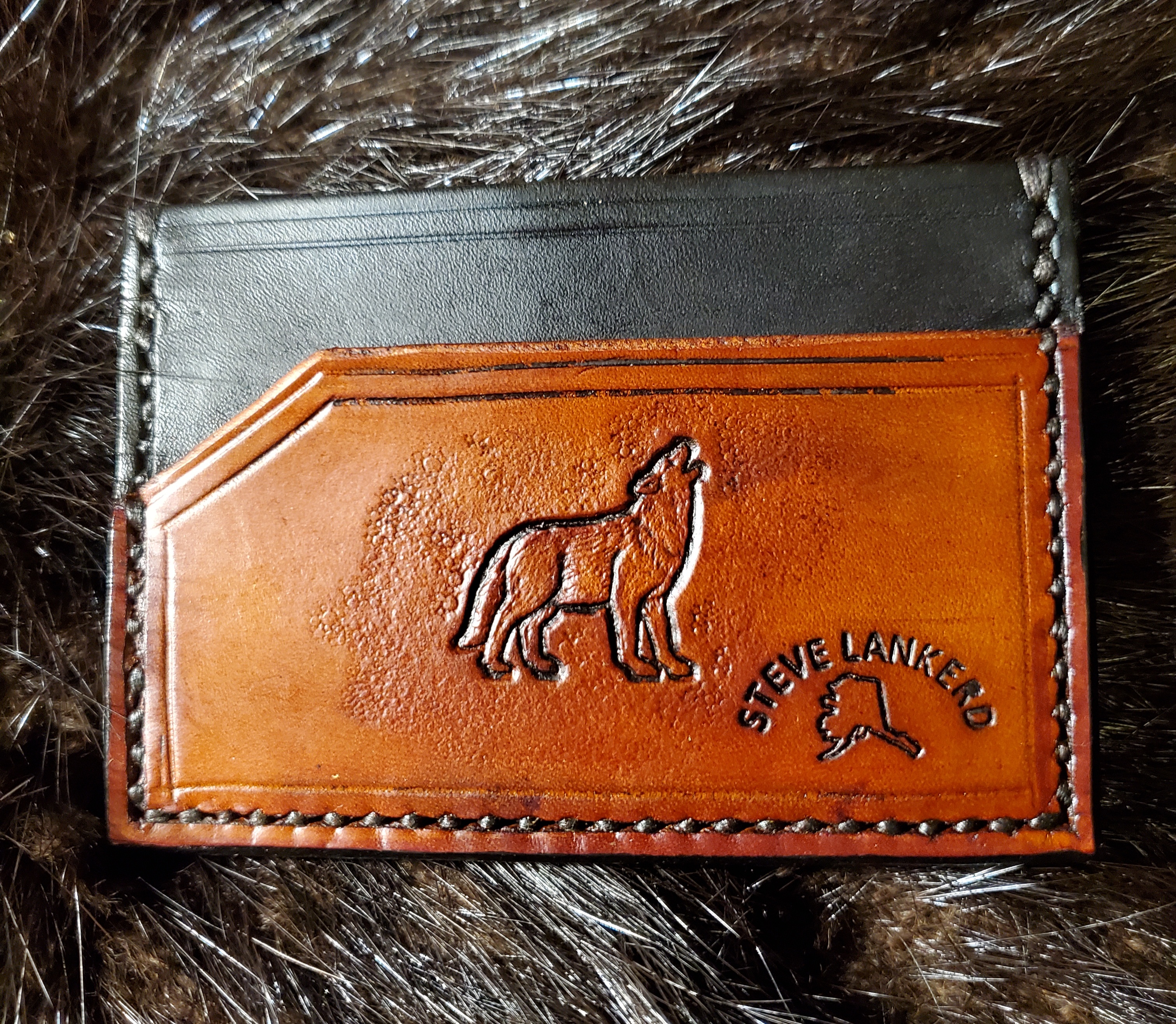 (Back)  Howling Wolf, 3 pocket Minimalist Wallet,  hand tooled, hand stitched,  $65.00