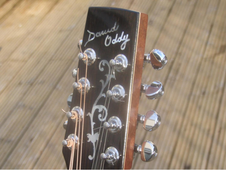 Standard peghead with our 'David Oddy' brand and 'vine' motif inlayed in mother-of-pearl