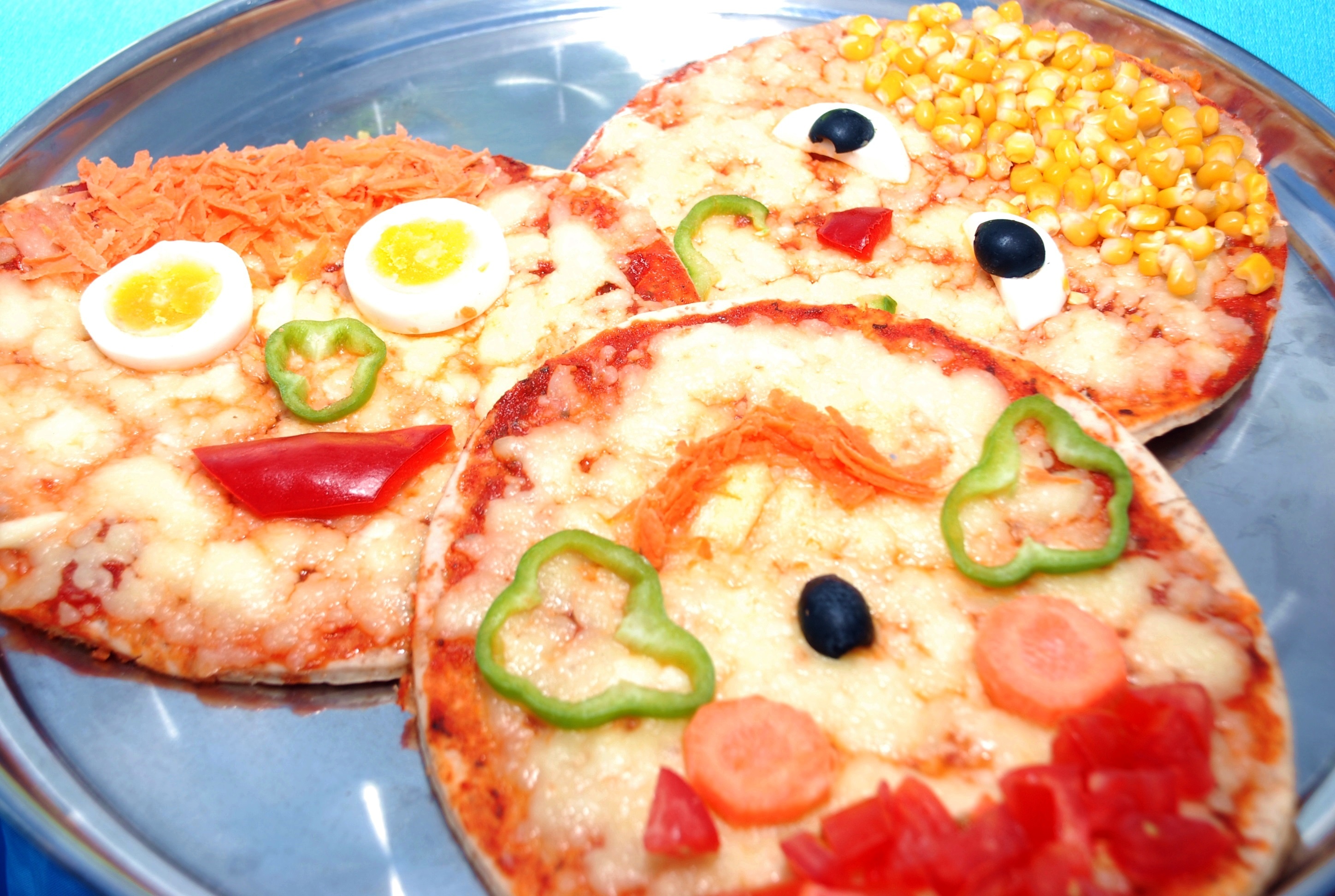 https://0201.nccdn.net/1_2/000/000/0e2/7ee/Pizzas-de-carita-feliz-2896x1944.jpg