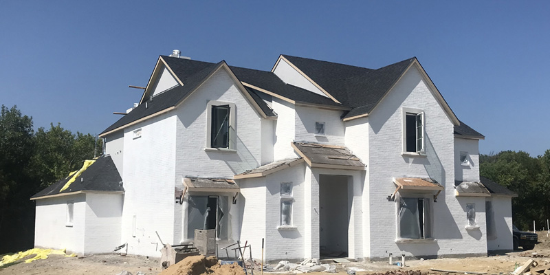 A new white home under construction