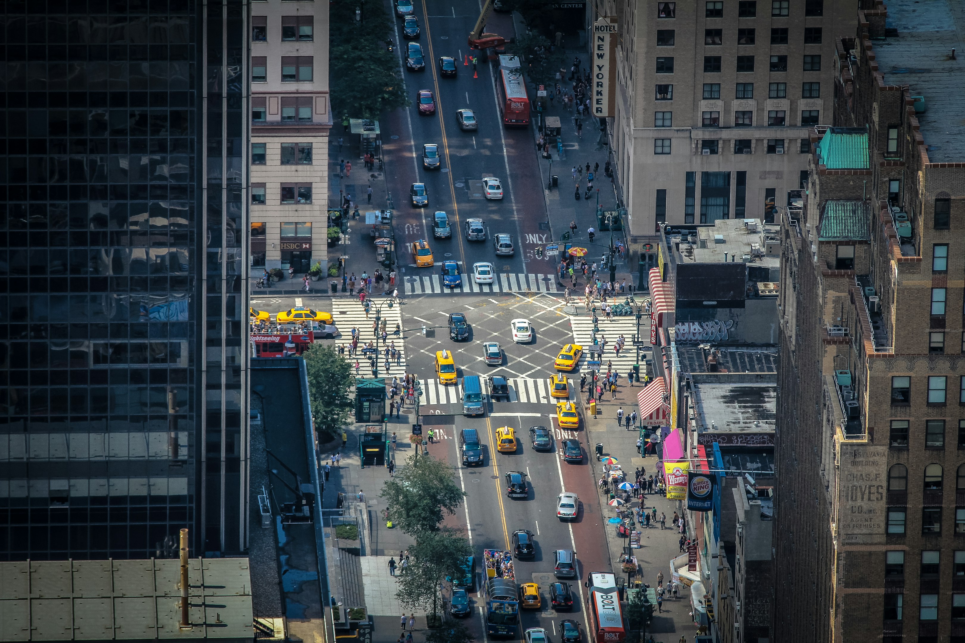 aerial photography of parked vehicle between buildings