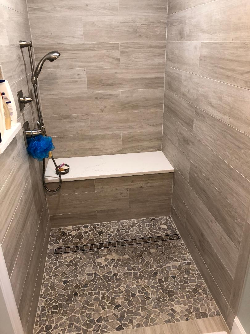 Featuring a linear drain on shower floor.

