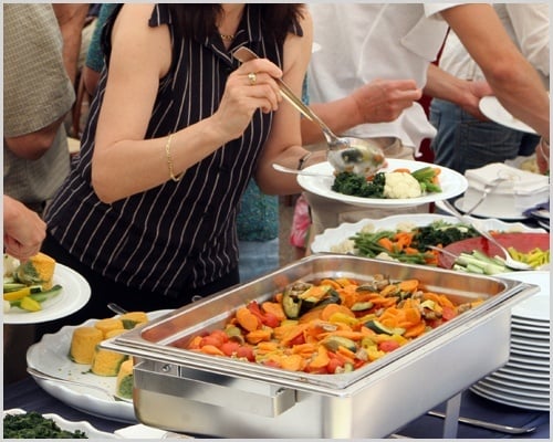 People Self Serving On a Buffet