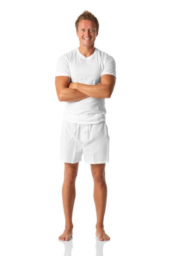 Blond woman in white shorts and a vest