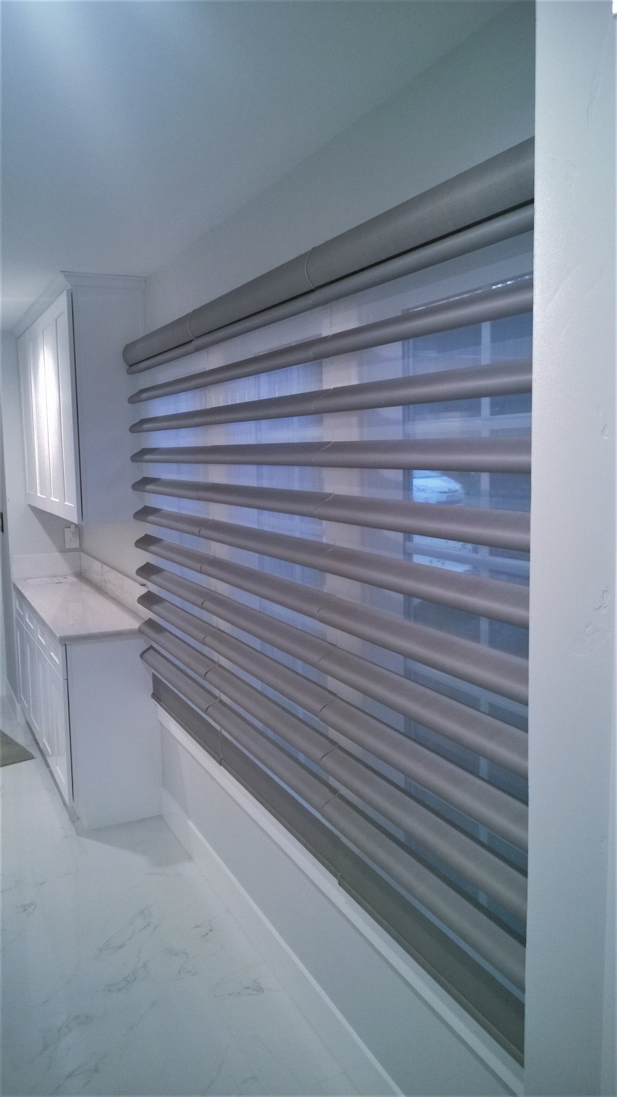 Hunter Douglas Powerview Pirouette in open position