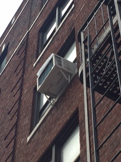 Notice the danger of ice sliding of the top of air conditioners