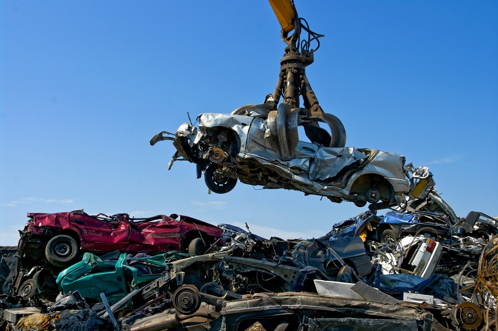 A Claw Crane Picking up A Salvaged Car
A Claw Crane Picking up A Salvaged Car