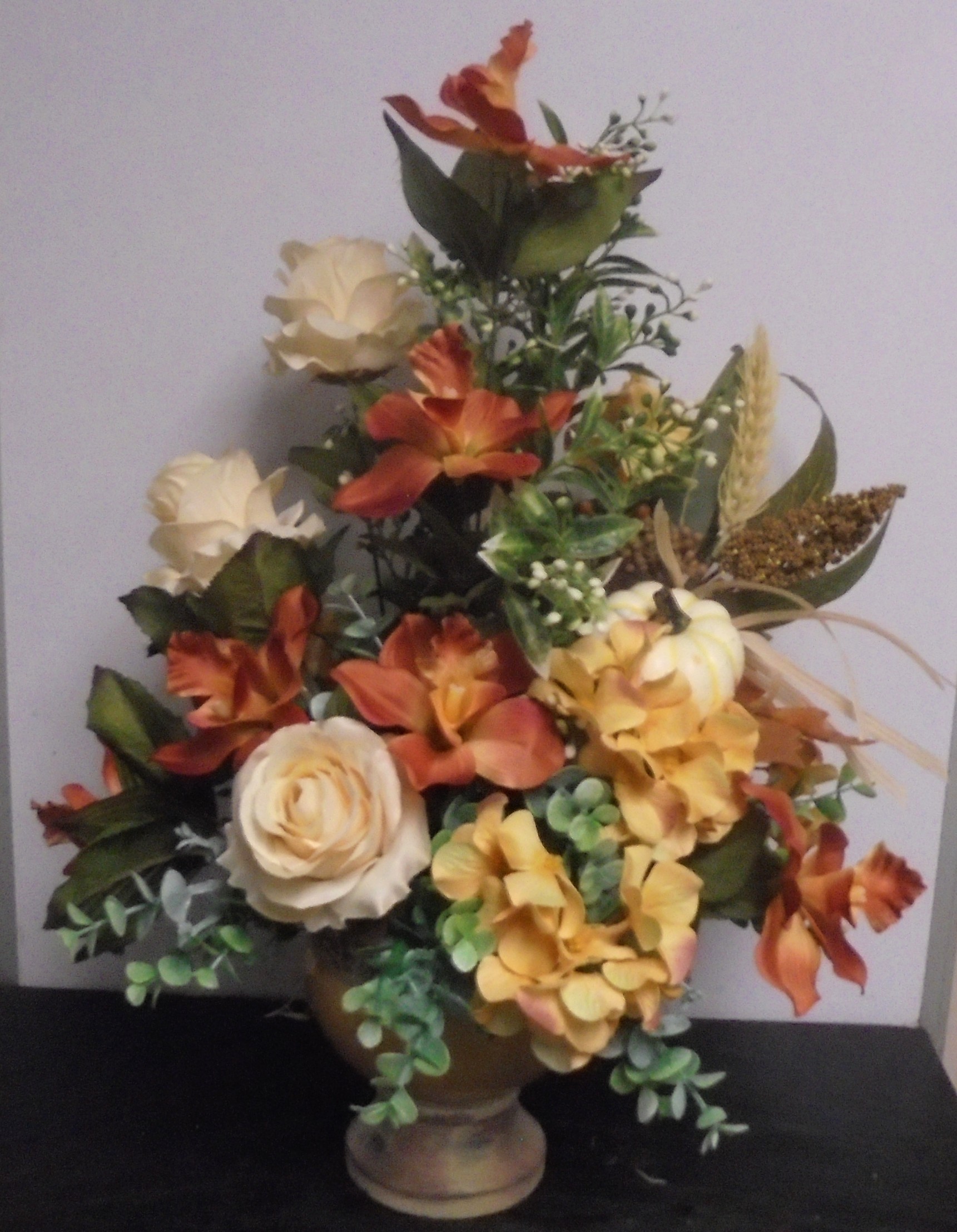 (41) "Silk" Fall Arrangement
W/ Pumpkin
$65.00