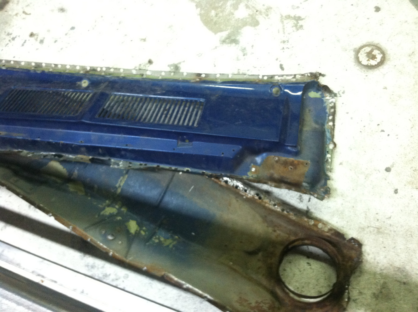 Rust thru lower cowl.