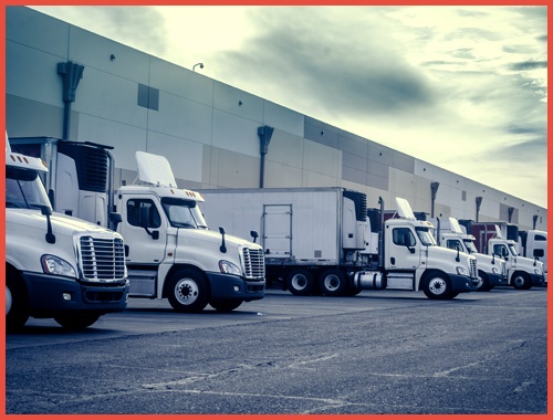 Trucks Lorrys Loading Unloading at Warehouse