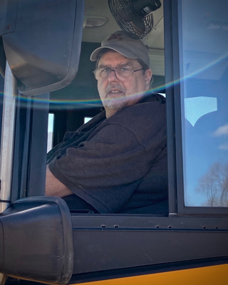 Larry has been driving for Koch since 2016.  He started in a van then got his CDL bus license.  Larry has driven for Watertown and he now drives route 118 out of Waconia. He enjoys his students and seeing how they interact with one another, as well as helping them. Larry also enjoys spending time with his family, reading, watching tv and mowing the lawn.