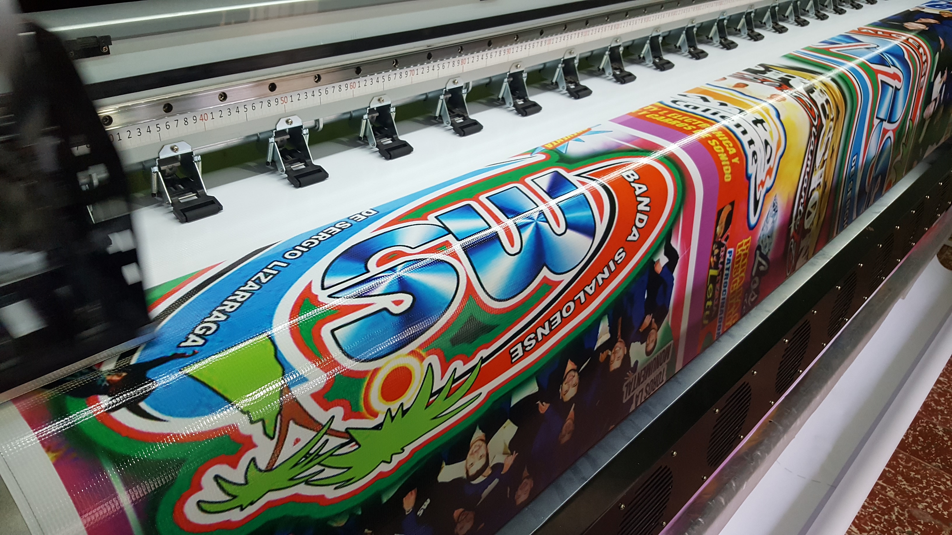 Red car in front of a sea landscape