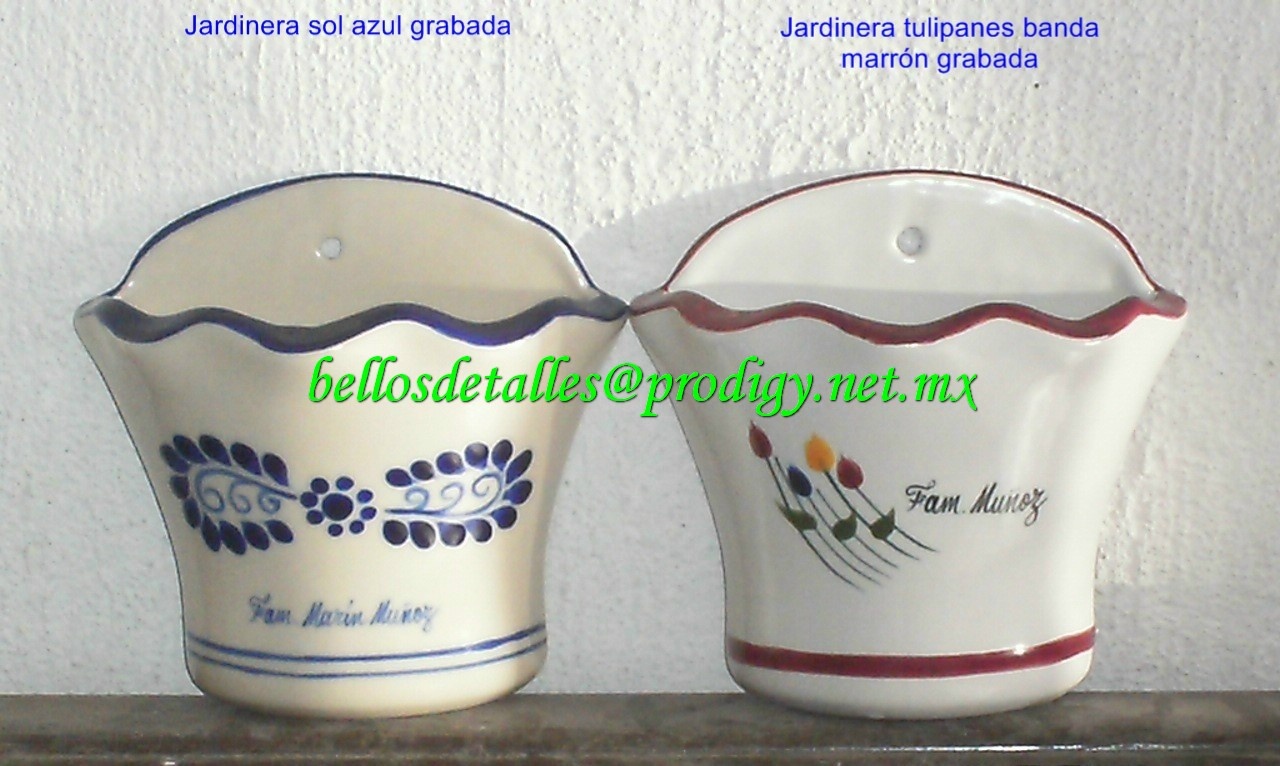 https://0201.nccdn.net/1_2/000/000/0ed/fd2/Jardinera-sol-azul-y-tulipanes-banda-marr--n-grabadas-1280x766.jpg