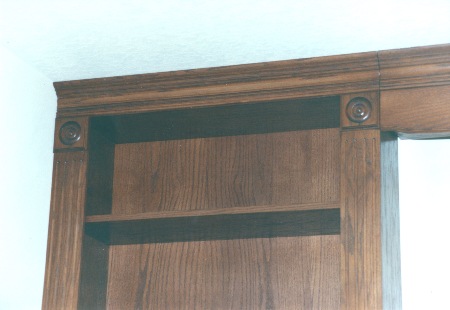 Details of fluted columns, rosettes, and crown molding are shown