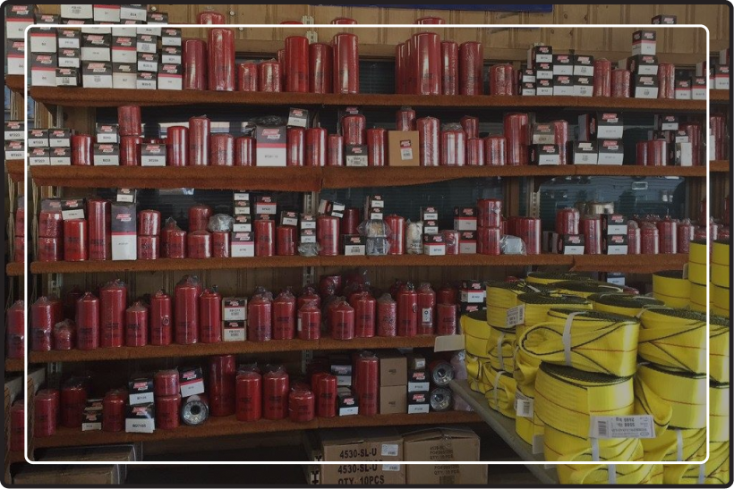 Inside the Truck Parts and Service Company’s store, the shelving with more parts.