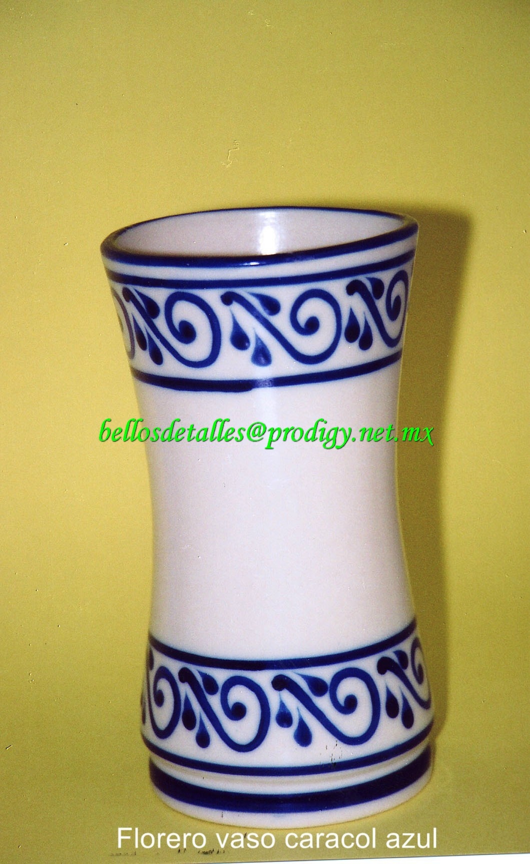 https://0201.nccdn.net/1_2/000/000/0f0/92f/Florero-vaso-caracol-azul-1059x1726.jpg