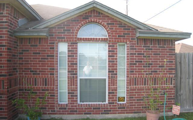Repaired exterior of brick home