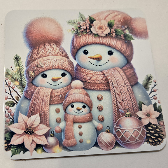 Square metal coaster with a snowmen design