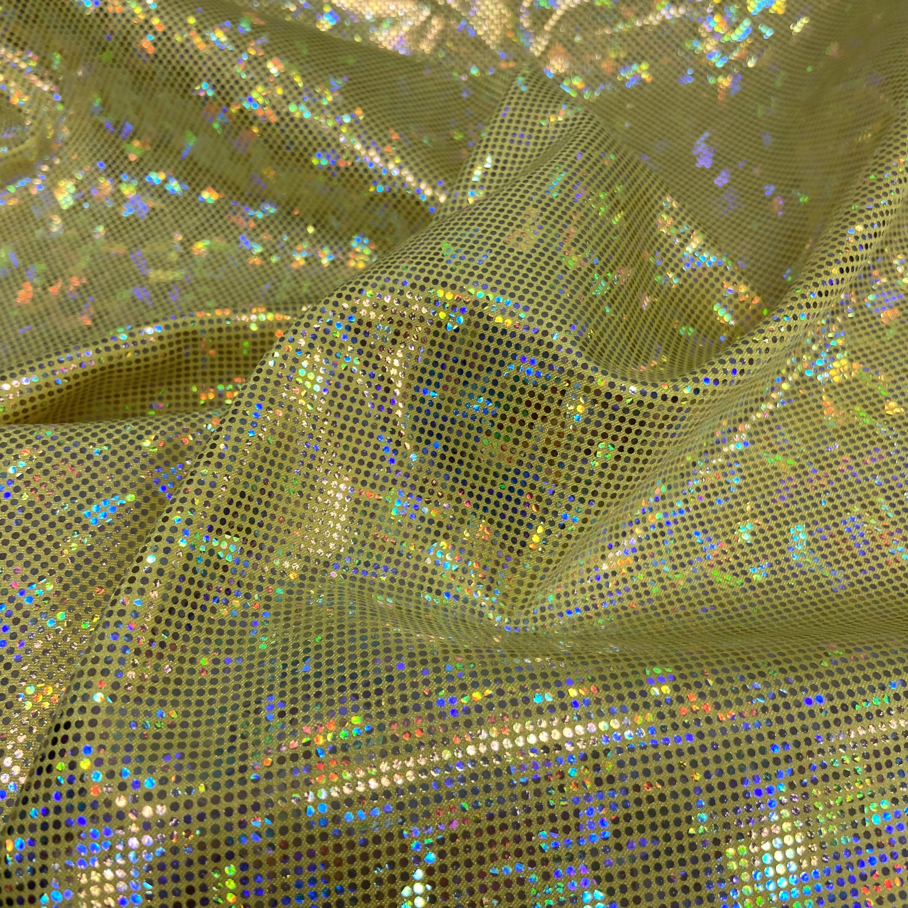 Gold shattered hologram on yellow