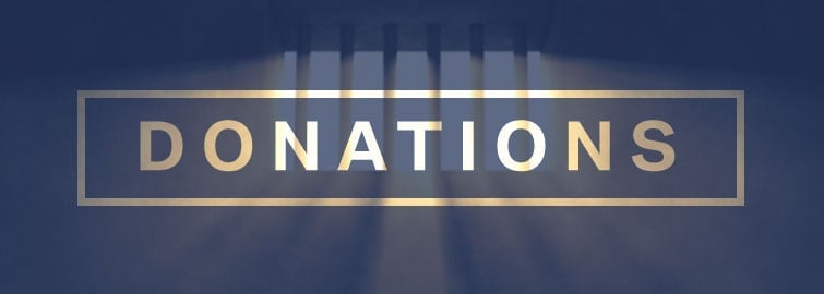 Illuminated 'Donations' sign with a blue background and beams of light. Illuminated 'Donations' sign with a blue background and beams of light.