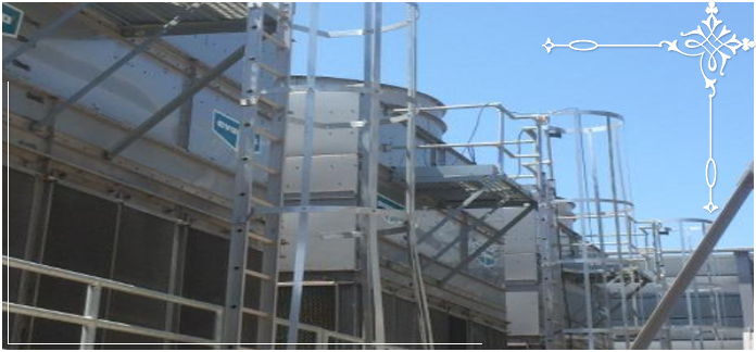 Iron ladder with surrounding cages leading to an iron platform off an industrial roof. Iron ladder with surrounding cages leading to an iron platform off an industrial roof.
