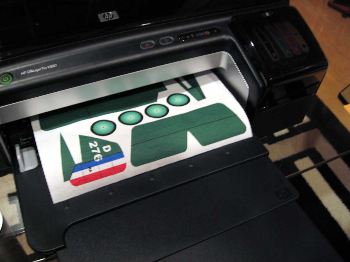 After the tissue/backing sheet is in the printer you can start printing your graphics. You might want to make some test pieces to see how well your printer handles adjacent colors. It may be necessary to reduce the amount of ink being applied to minimize any color bleeding. We have found that draft, or economy modes work best. Some printers will also do well on the normal mode. This latter mode applies more ink for bolder color.