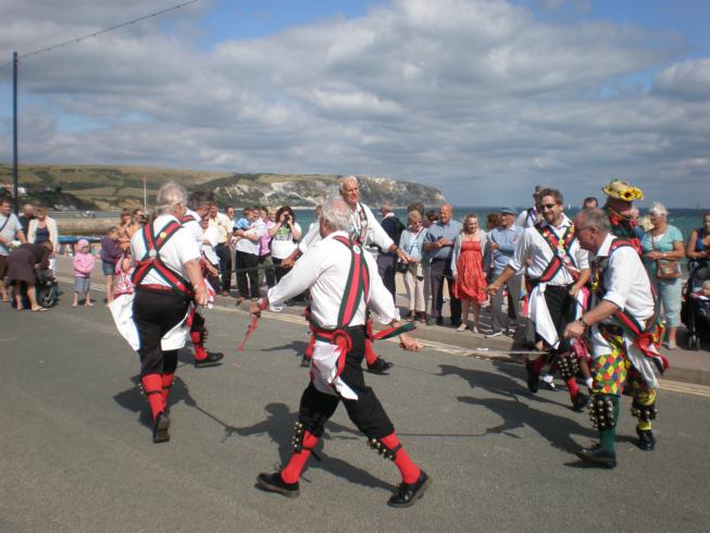 Merrydowners performing on the sea front -  Hemsley sword dance