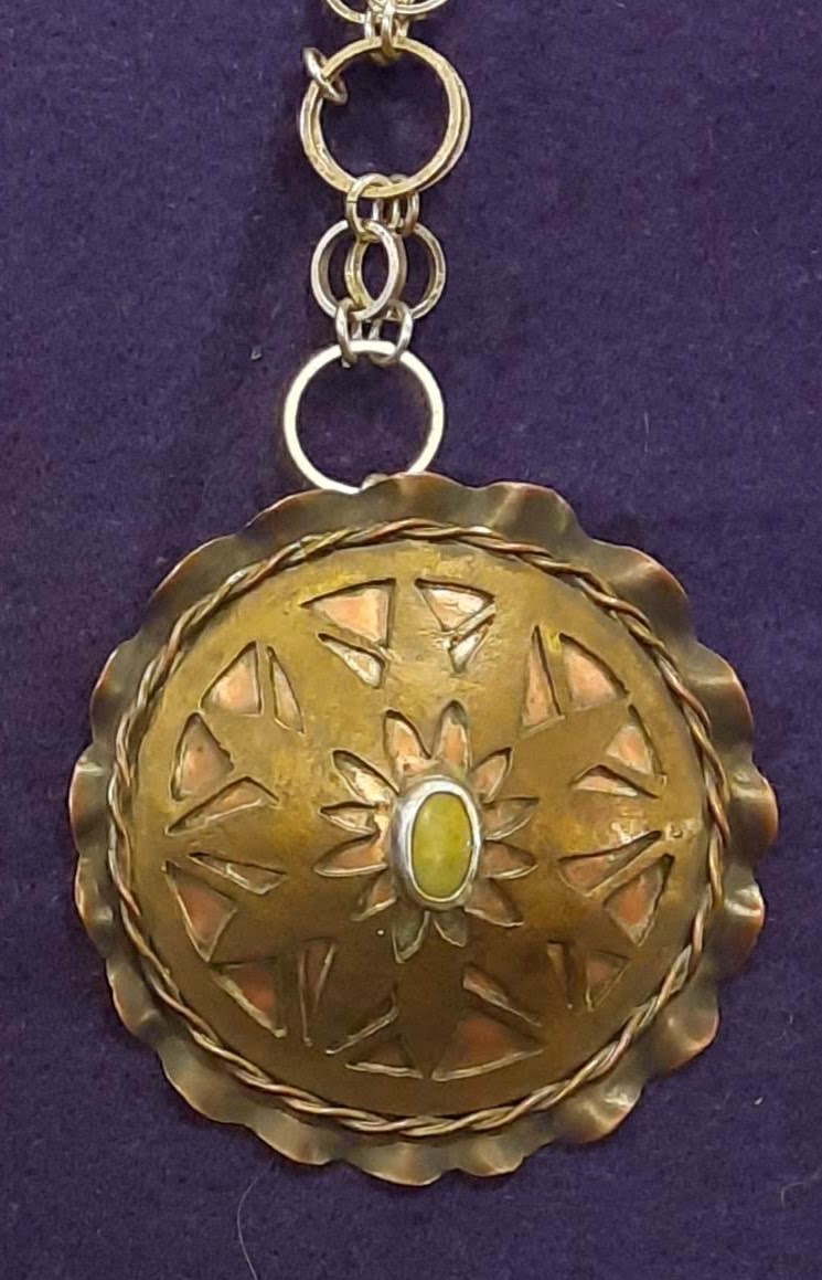 JPn003a SNOWFLAKE Brass, Copper, and Silver  with  Quartzite Pebbles private collection front