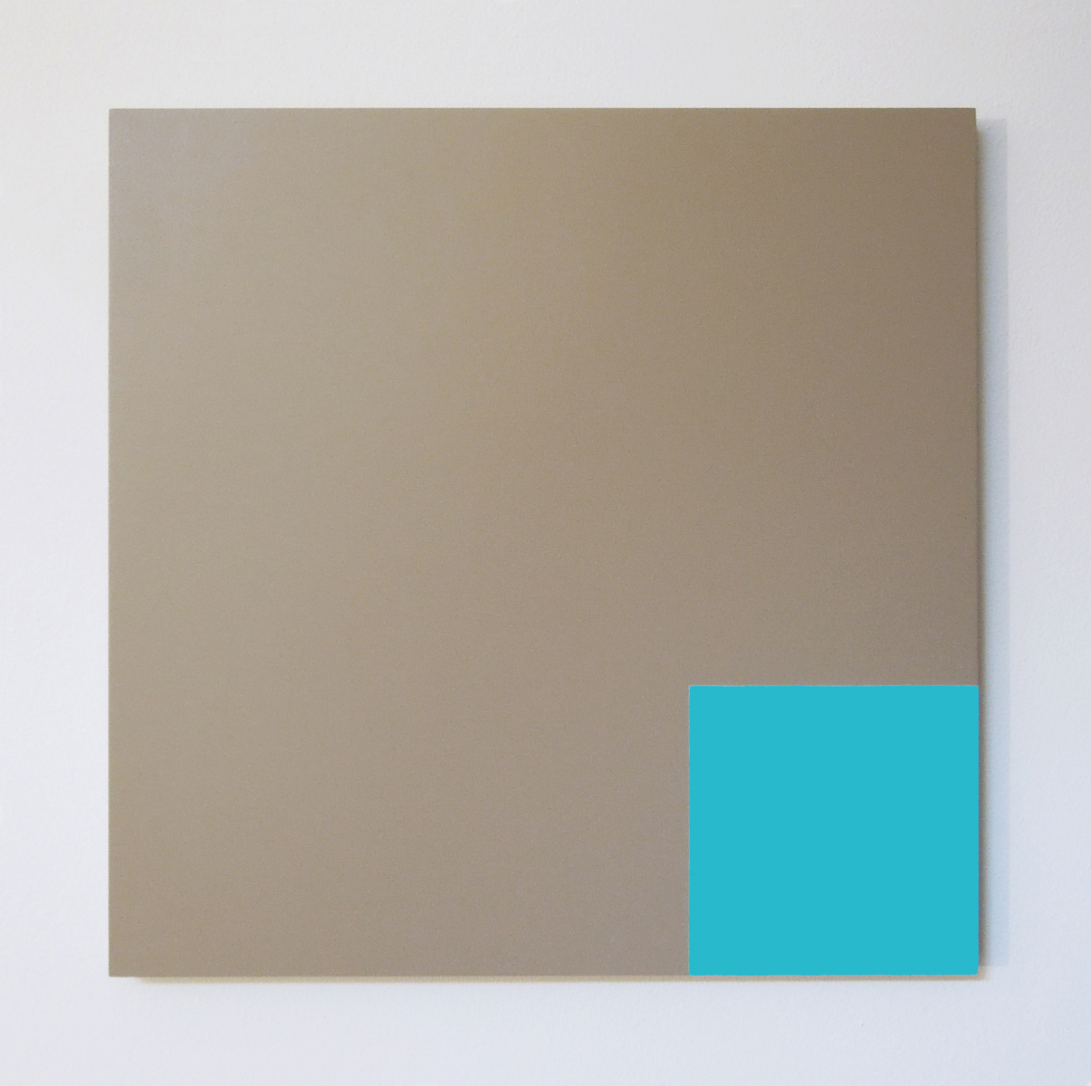 A minimalist taupe square panel with a turquoise square painted in one corner.