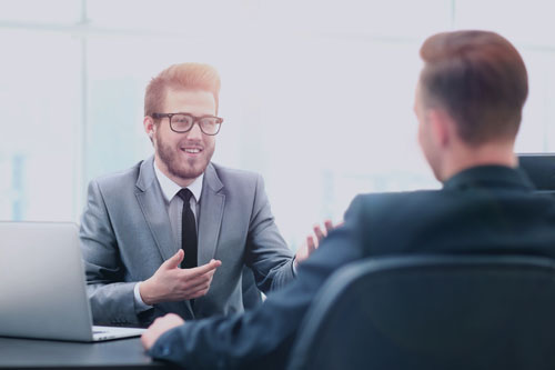 Happy Business People Talking on Meeting