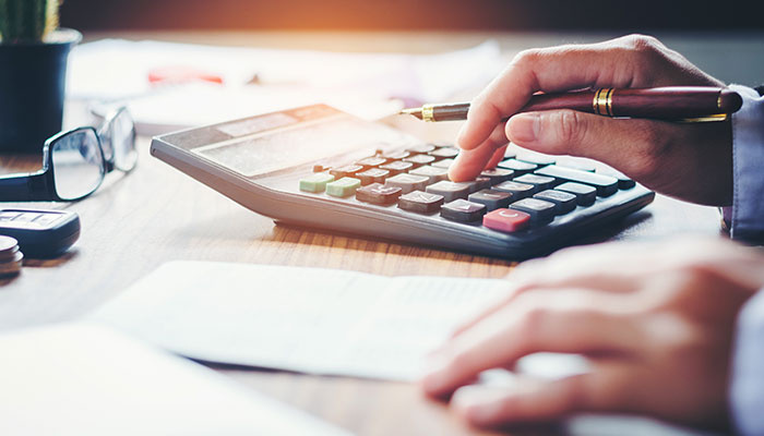 Businessman's Hands with Calculator. Businessman's Hands with Calculator.