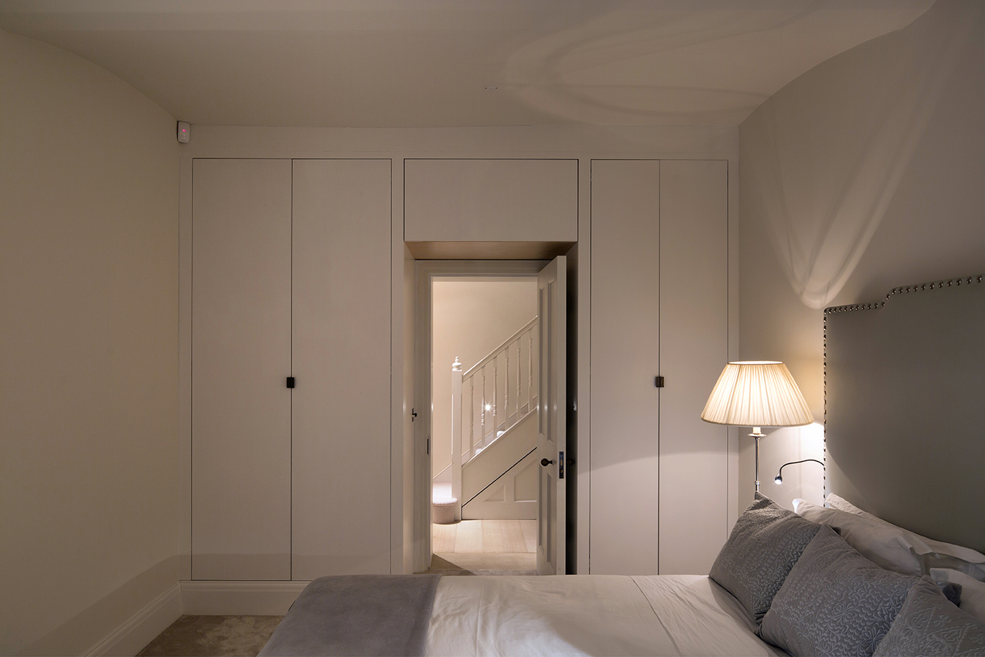 a room with a table and chairs