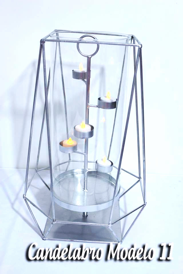 Candelabro Octogonal
 con velas led 
Medidas 50cm Altura x 39cm Ancho  
$ 50.000