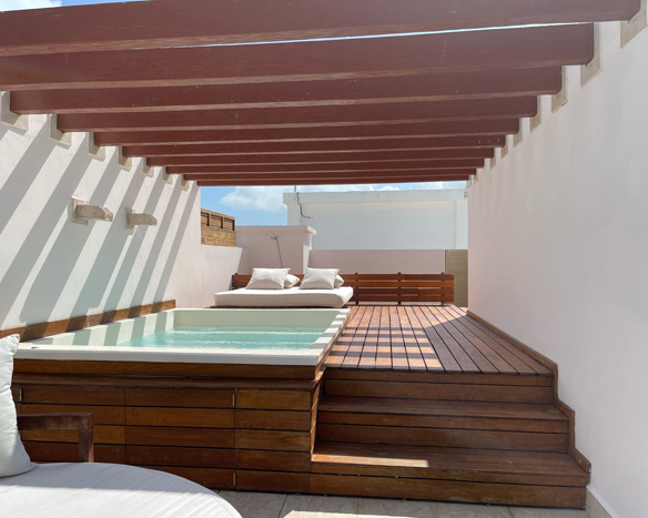 A hot tub cabana on a cruise ship deck.