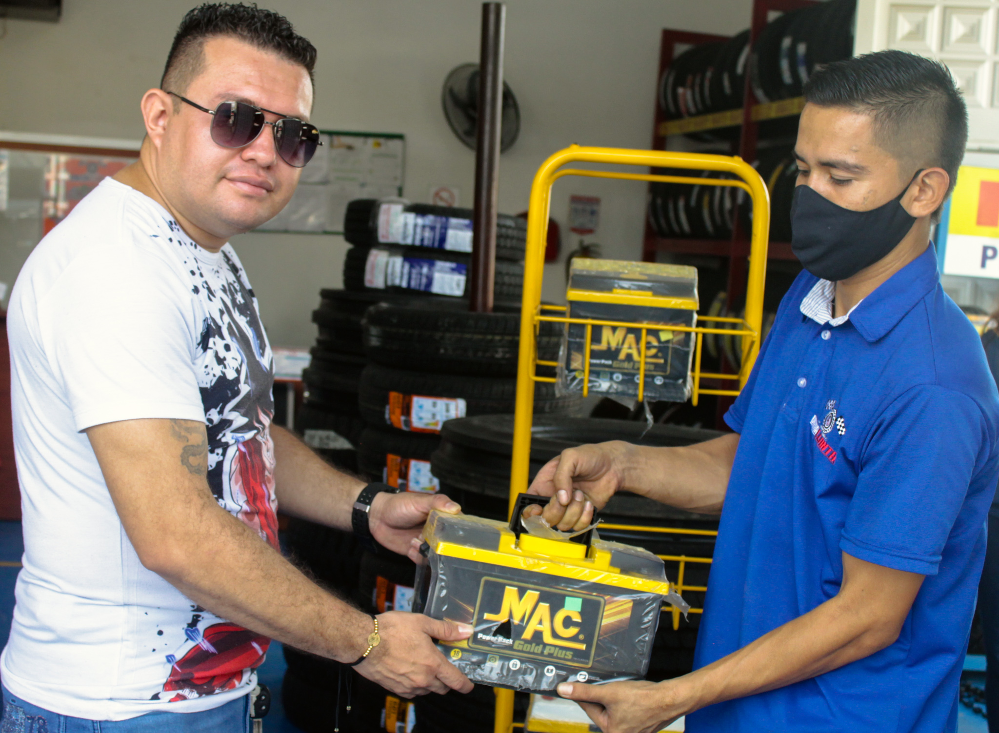 Hands over a car model