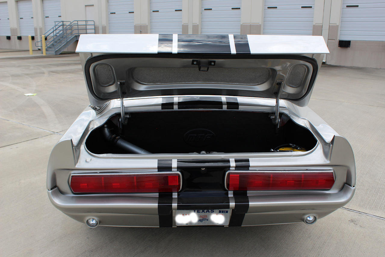 Top of bumper where it meets the tail light panel. BAD $99,000 at Gateway Classic Cars Houston