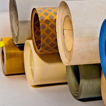 Female surfer diving under a wave