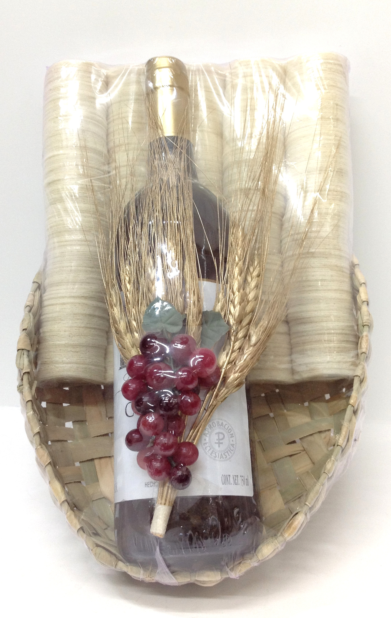 PAQUETE DE HOSTIA GRANDE, VINO  DOMECQ, CANASTO CON ARREGLO