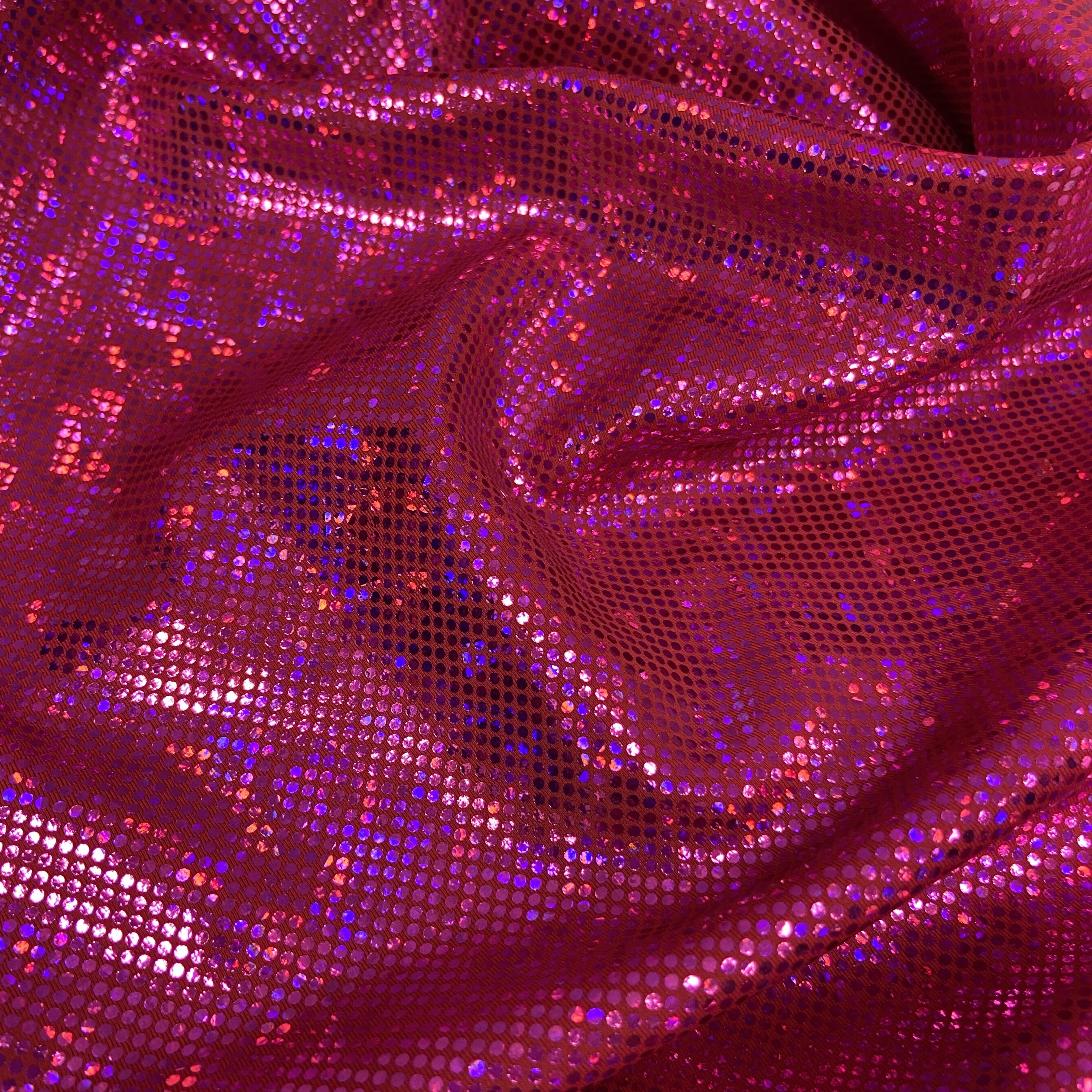 Pink shattered hologram on red 