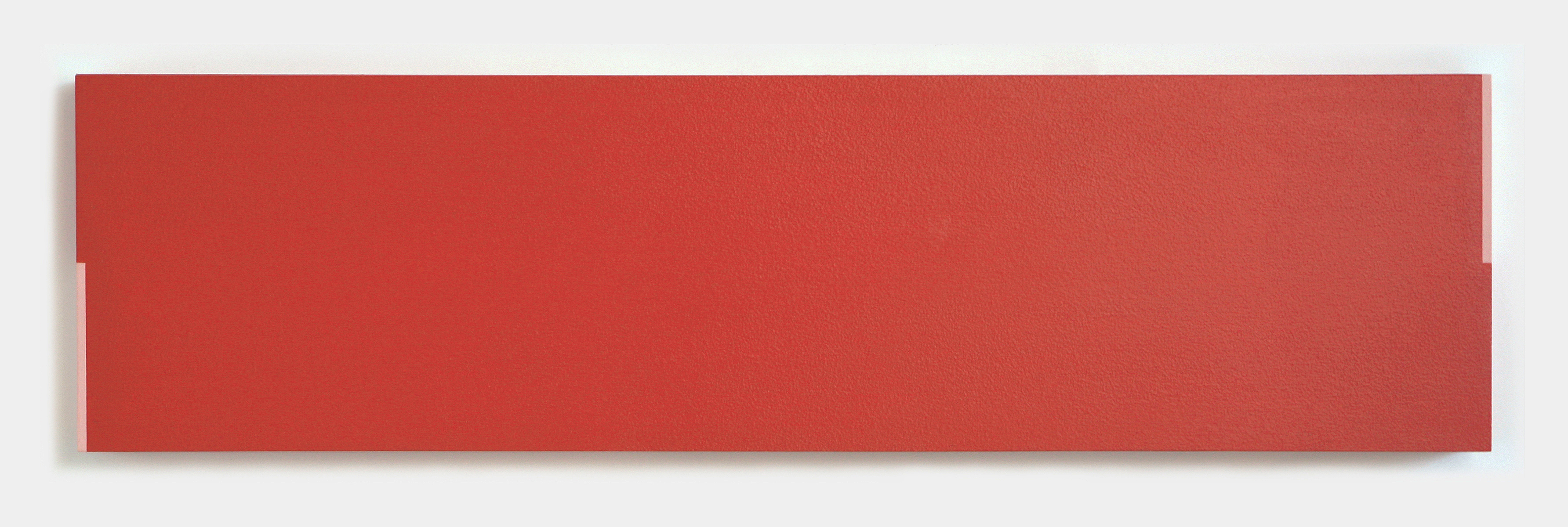 A long rectangular red painting with thin pink rectangles painted on two corners.