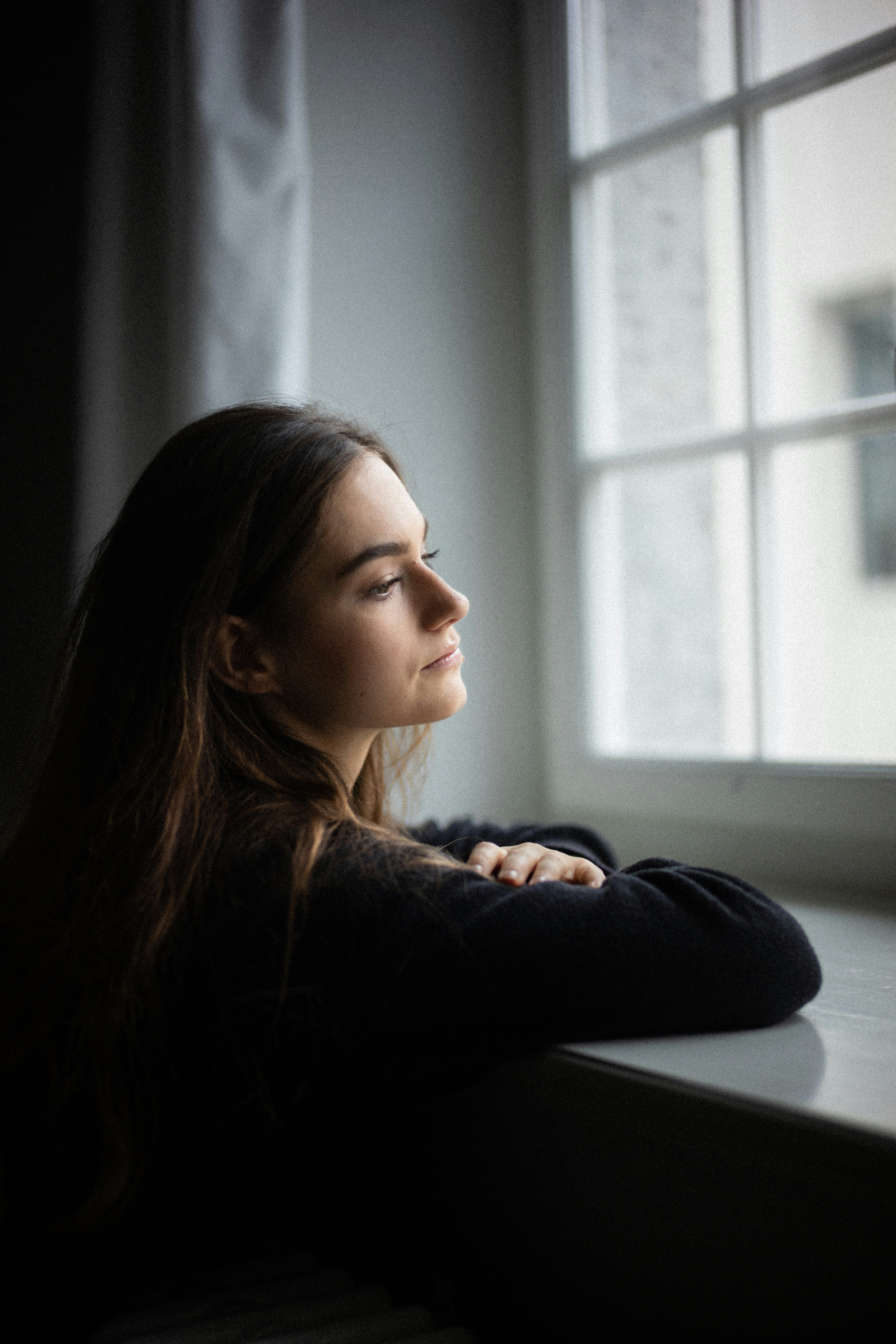a woman sitting at a desk