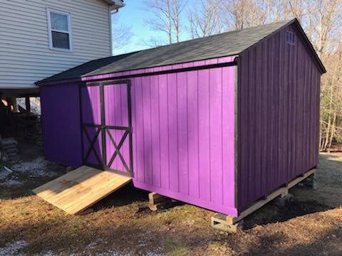 12 x 20 Standard A-Frame In Wood              
                                                                  Featuring Impulse Purple colored wood siding, black trim, and black colored 30 year architectural shingles. Standard features include: gable vents, 2- 18”x27” slider windows with screens, choice of standard color combinations , 6’ double doors, pressure treated floor joists.

Featured options: custom paint, treated ramp, 5- treated perpendicular leveling runners
