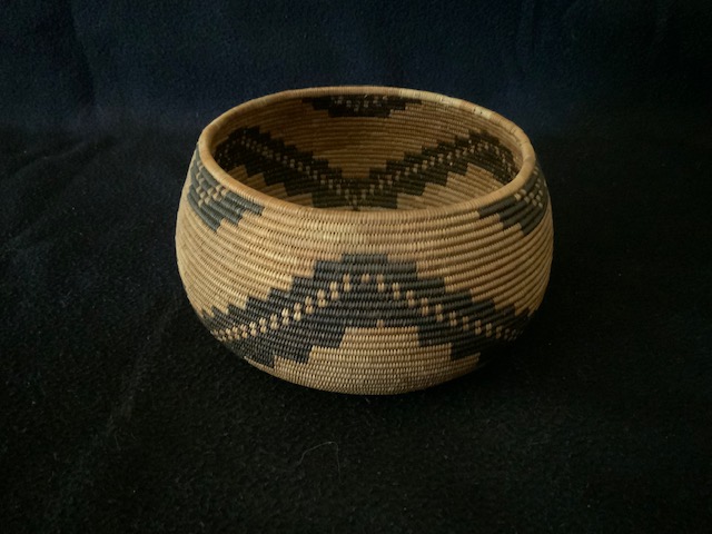 PRODUCT PROFILE
Product No:  #71303
Description: Maidu Basket
• Stepping vertical image.
Juncus, peeled and dyed redbud.
• Size: 3 1/2” height x 6” width.
• Circa: 1930’s 
