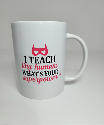 15oz ceramic mug featuring a I teach tiny humans design