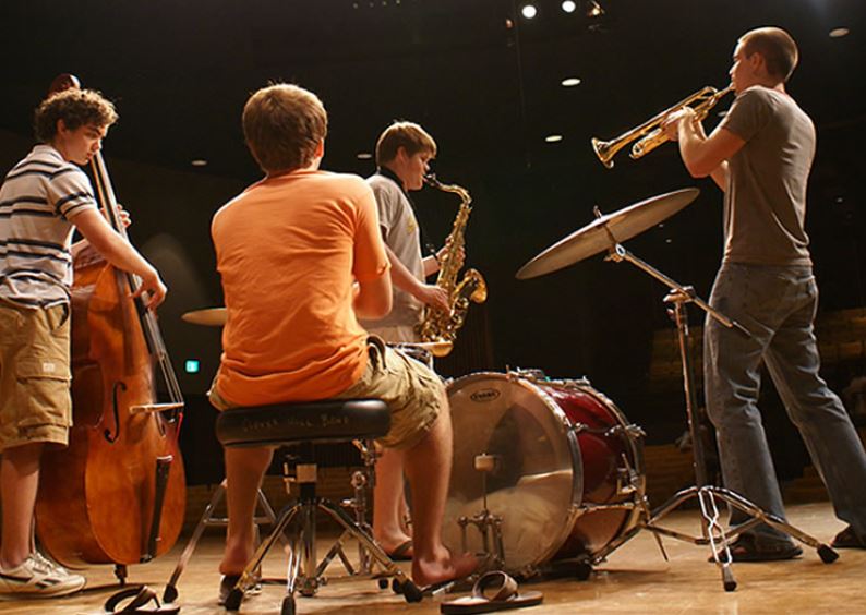 Students play music in the Jazz band.