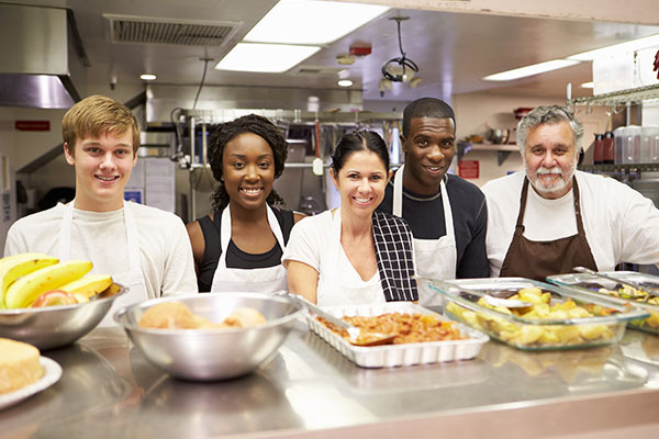 Portrait Of Kitchen Staff In Homeless Shelter