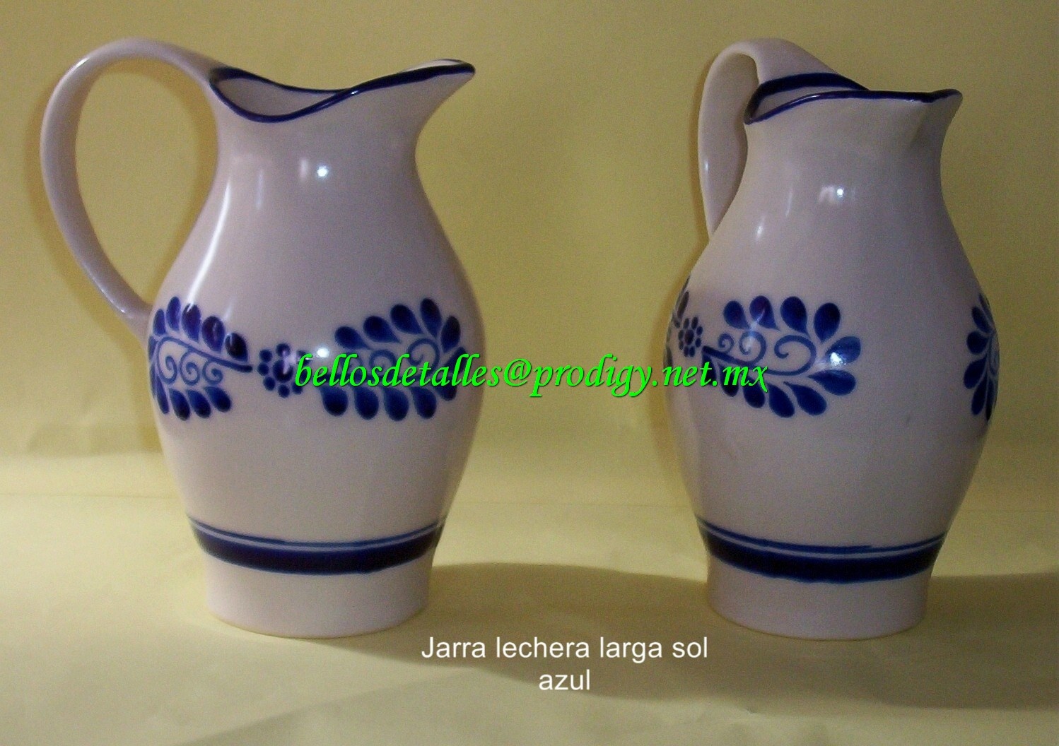 https://0201.nccdn.net/1_2/000/000/107/ea9/Jarra-lechera-larga-sol-azul-1498x1056.jpg