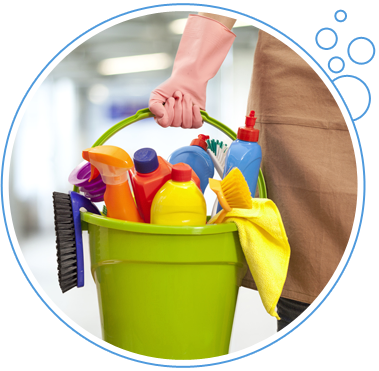 Woman Holding Cleaning Supplies in Building